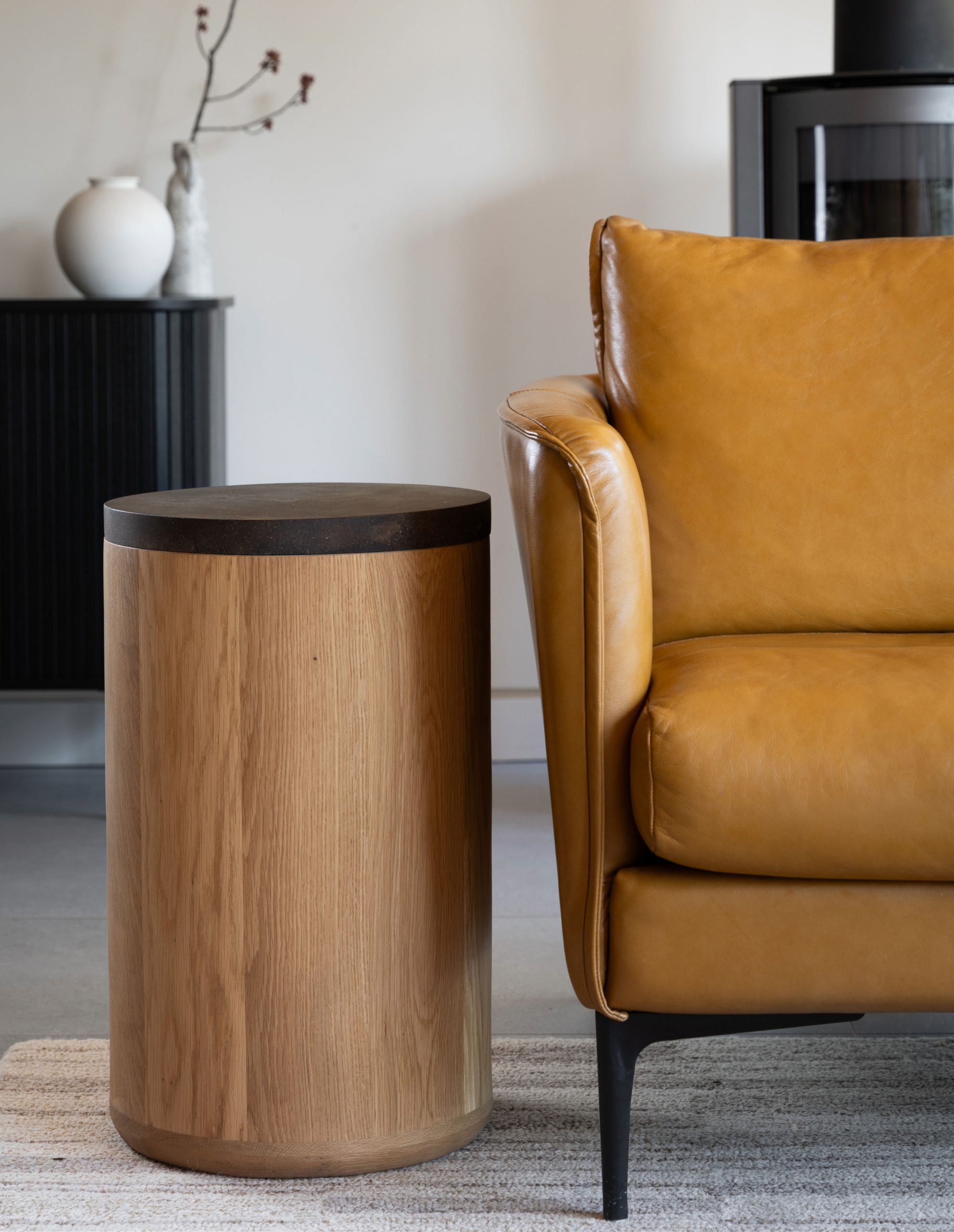 Round side table with removable coffee shell top revealing hidden storage compartment with fabric interior